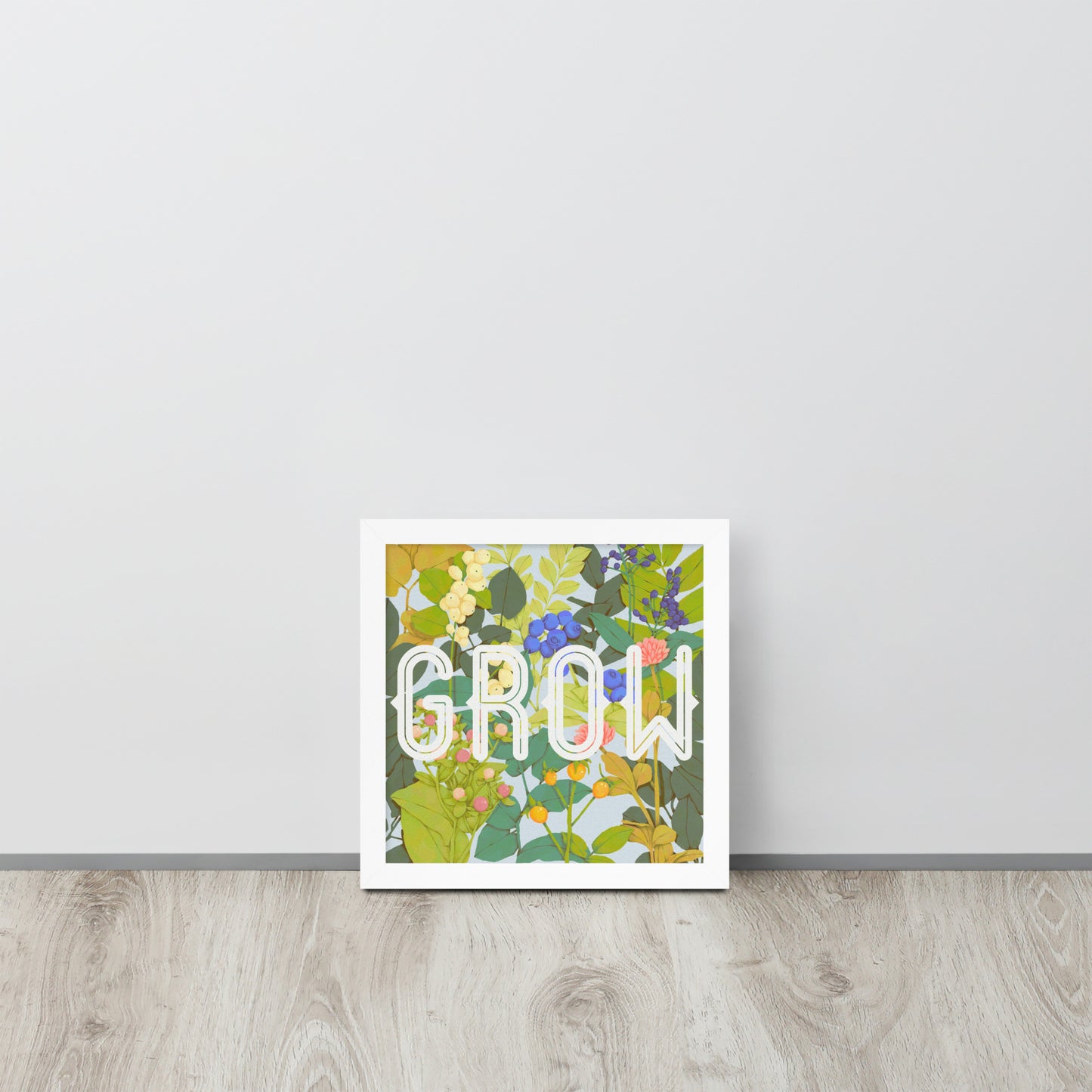 Decorative wall art with floral design and 'GROW' text on a white background