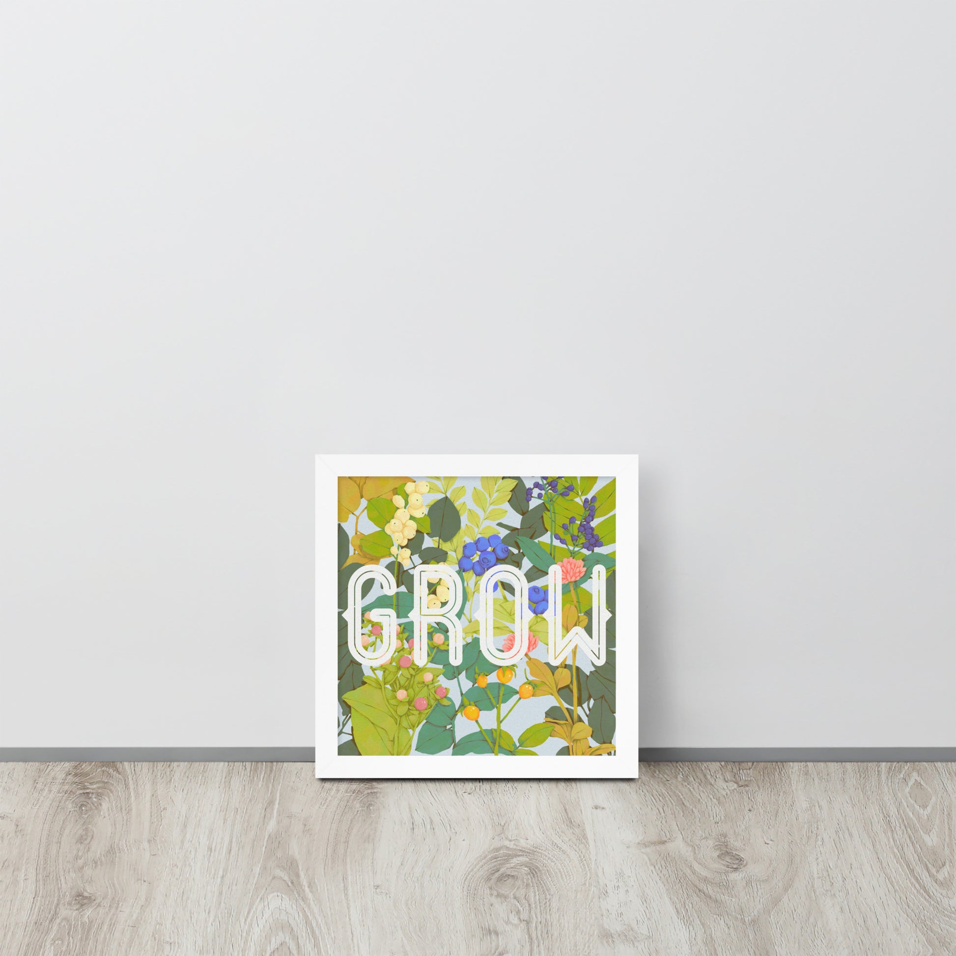 Decorative wall art with floral design and 'GROW' text on a white background