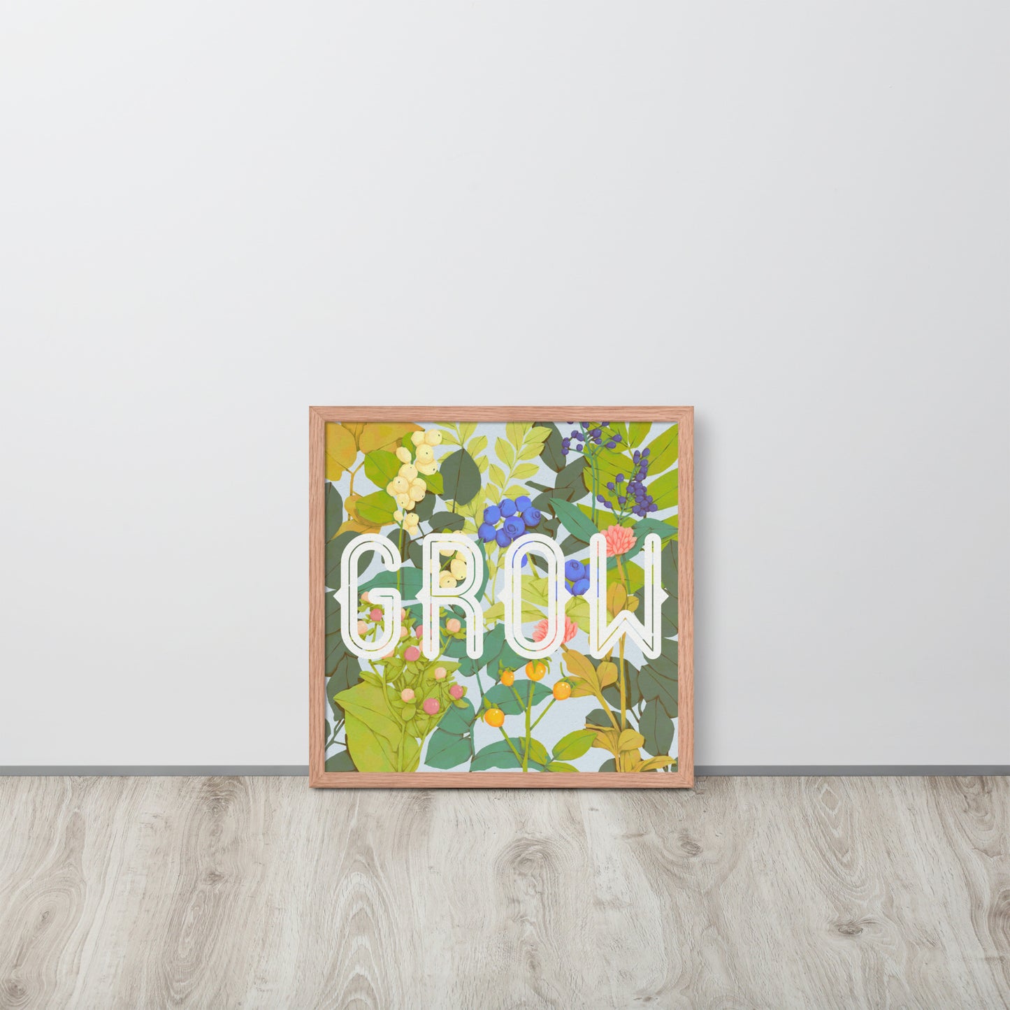Framed artwork with floral design and 'GROW' text on a white wall.