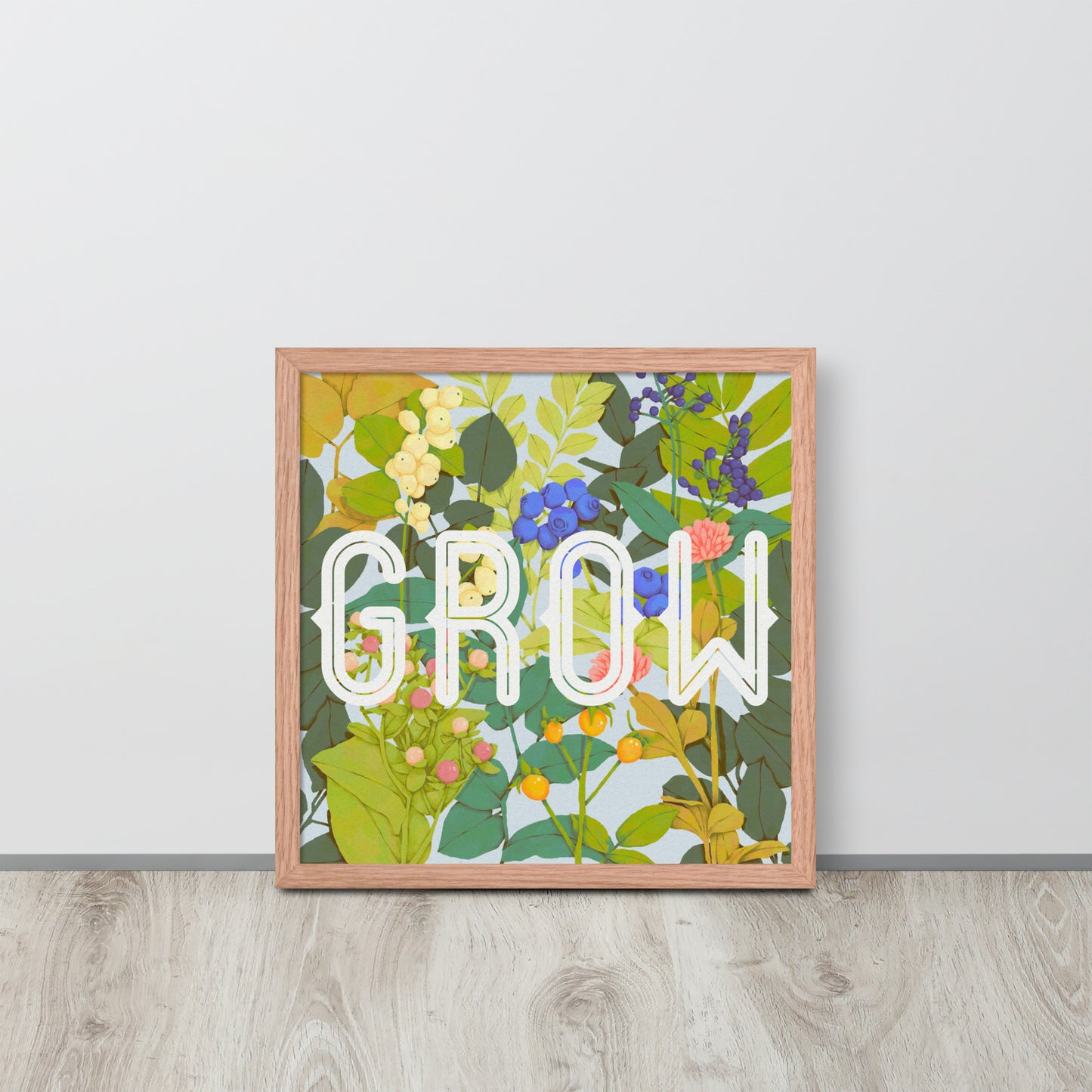 Framed artwork with floral design and 'GROW' text on a white wall.