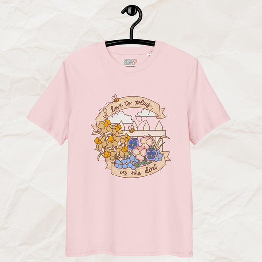 Pink t-shirt with floral design and text on a hanger against a white background
