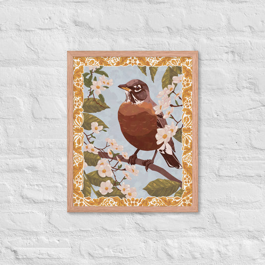 Framed artwork of a bird on a branch with flowers on a textured white wall