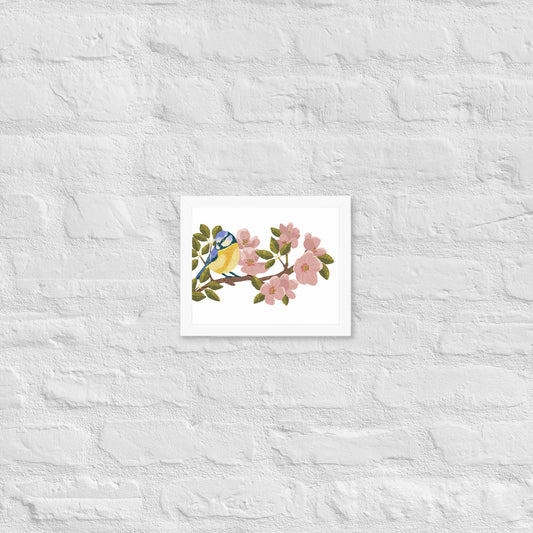 Framed art with a bird and cherry blossoms design on a textured white background