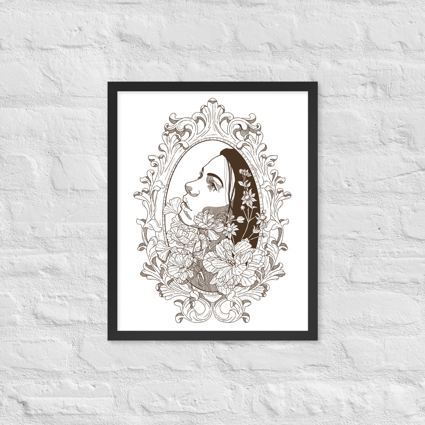 Framed artwork of a woman's face with floral elements on a textured white wall.