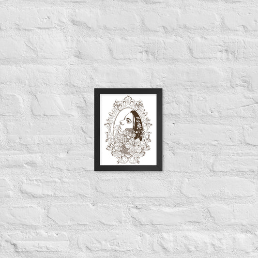 Framed artwork of a stylized face with floral elements on a textured white wall.