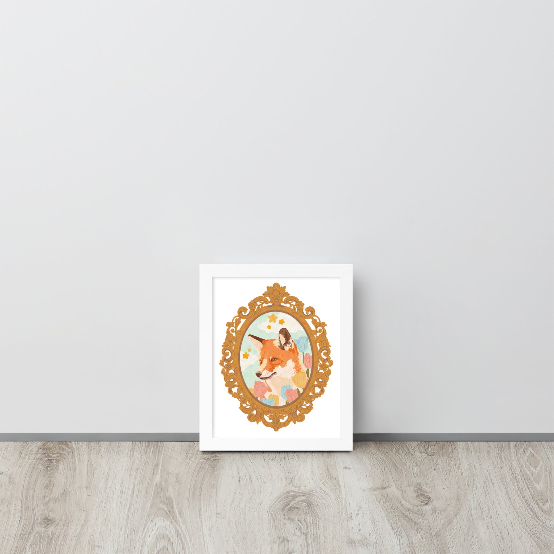 Framed artwork of a fox with a decorative border on a white wall.